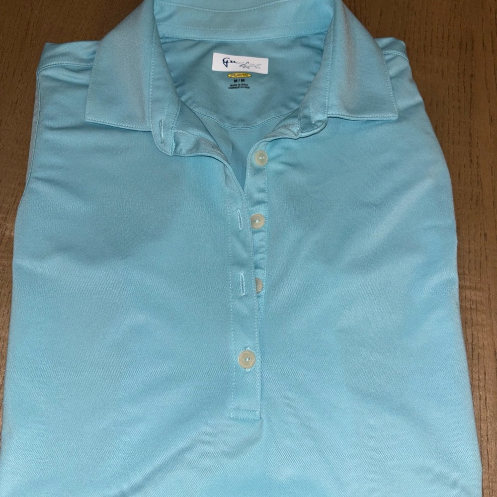 Ladies Greg Norman Collection Light Blue Sleeveless Golf Shirt